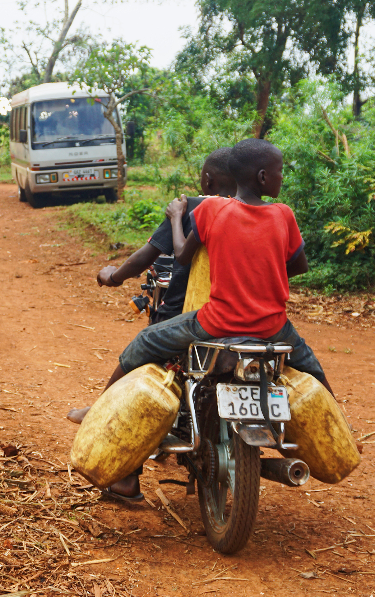 People on a motor bike in Uganda. Source: Melissa Askew via Unsplash